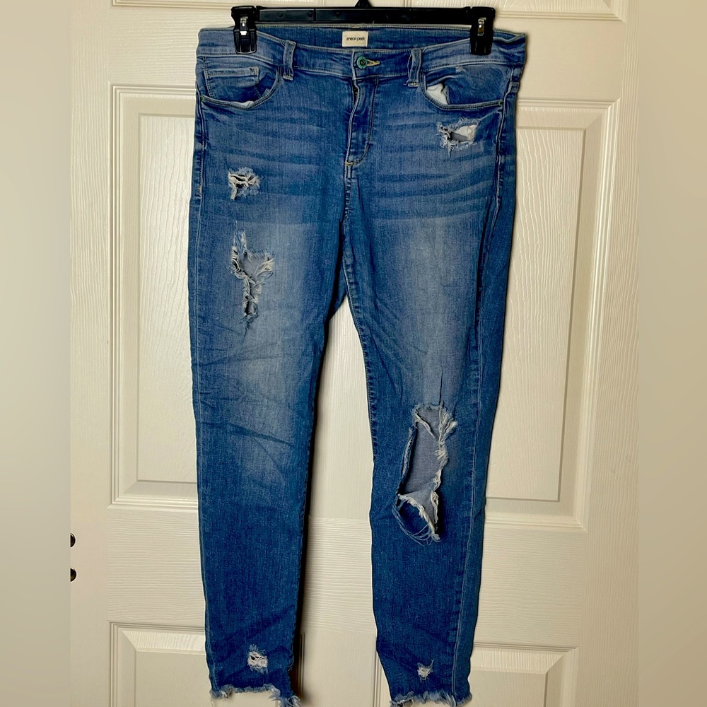 Distressed Mid-Rise Skinny Jeans